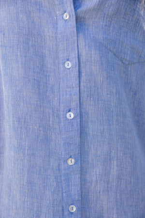 Close-up of a UPF 50+blue button-up dress with sun protection 