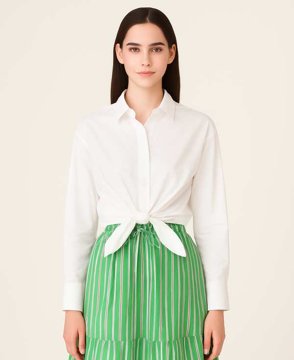 Woman wearing Crisp white UPF 50+ top and green skirt with sun protection on a white background