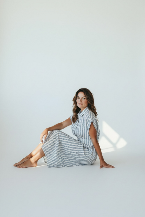 Blue floral stripe UPF 50+ cotton dress for women on white background